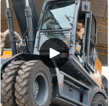 An experienced operator reviewing a Xinyuan wheeled excavator