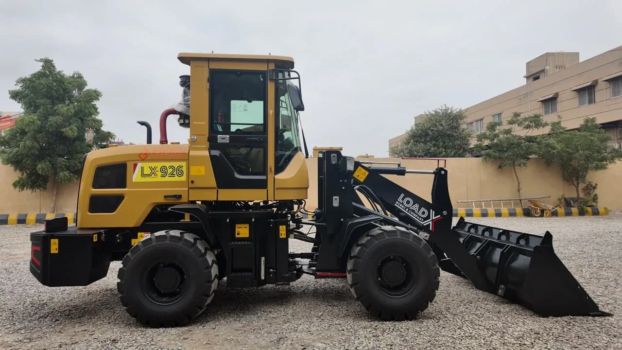 LOAD-X LX-926 wheel loader, side view, carrying its LX 926 badge