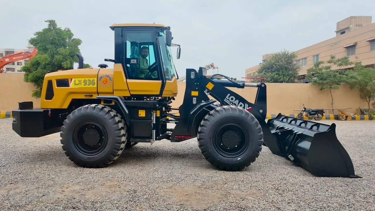LOAD-X LX-936 wheel loader, side view, carrying its LX 936 badge