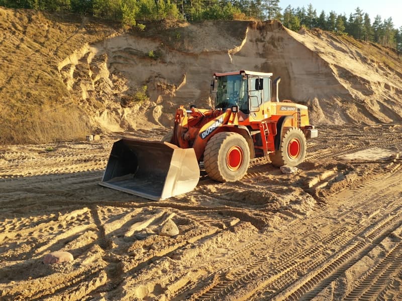 Bulldozer working a cut on a construction site